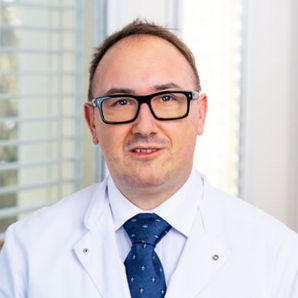 Dr. medic. Andrei Simpetru Dr. medic. Andrei Simpetru